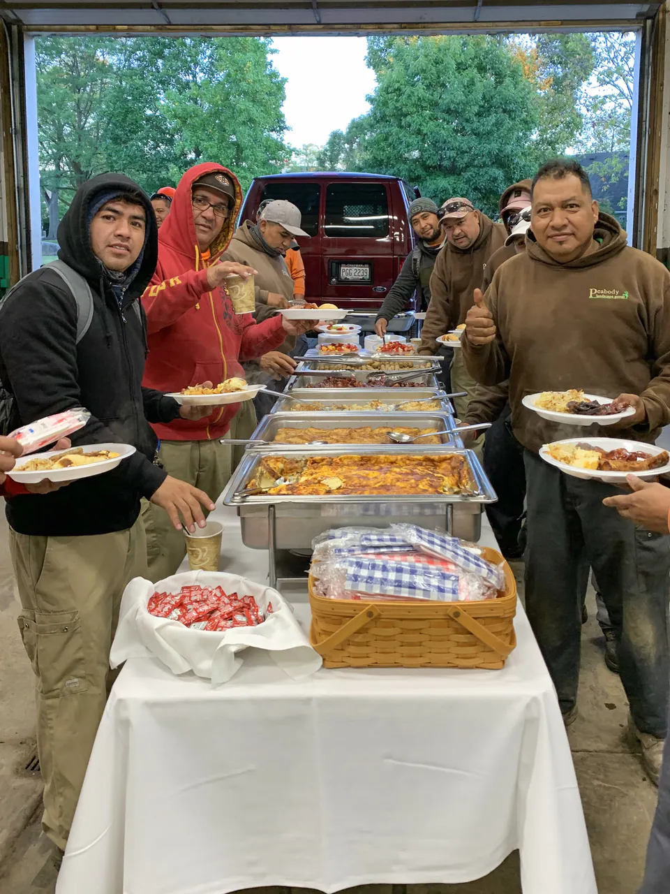 Peabody crew members sharing a team meal